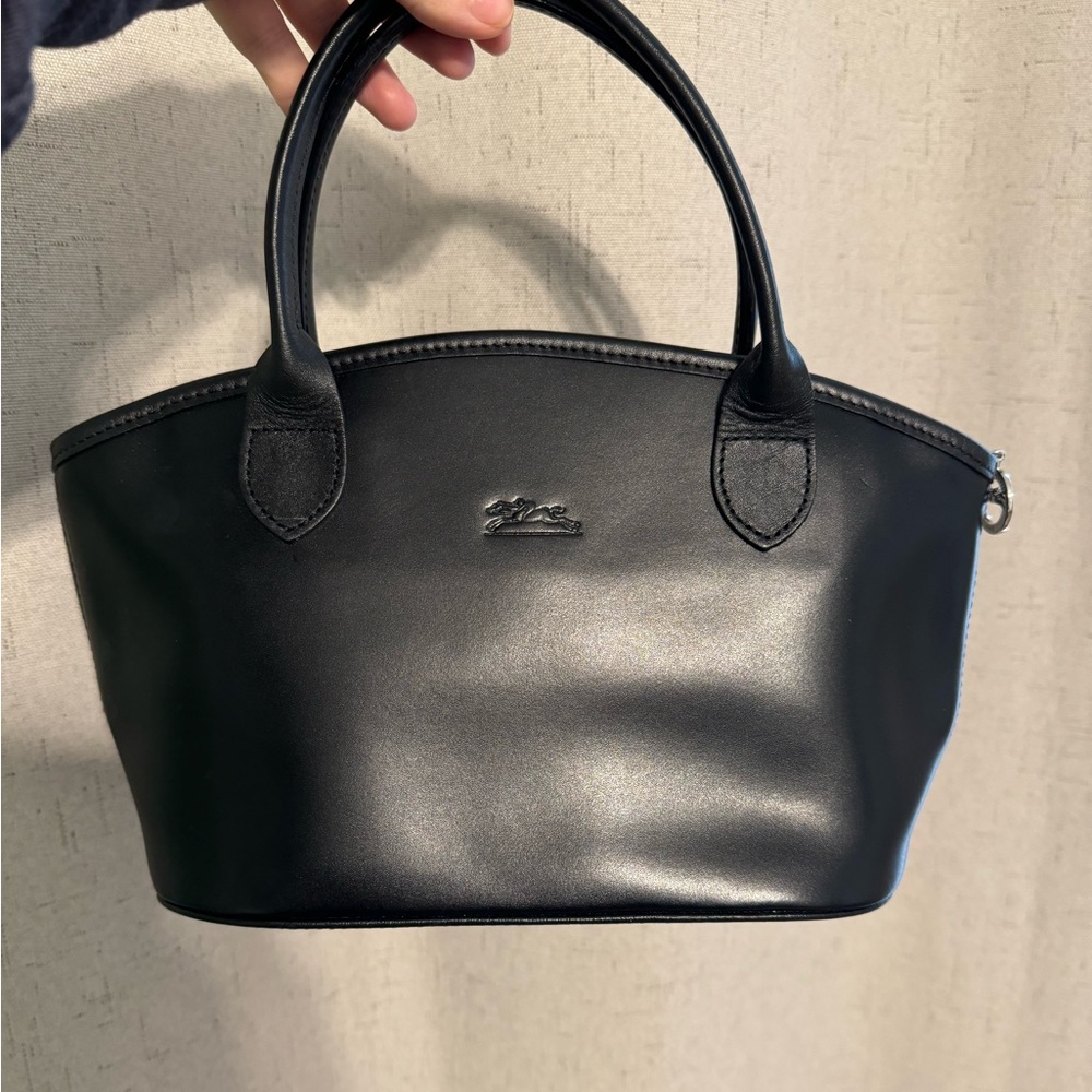 Amazing condition. Leather mini Longchamp double handle tote. Great condition.